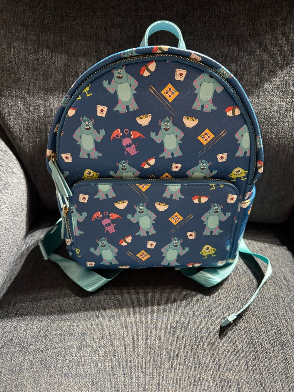 Danielle Nicole Blue Mini Backpack with Monster Inc Print